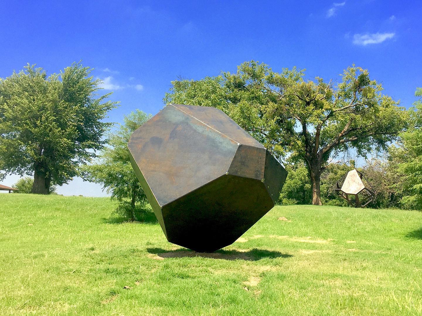 Outdoor sculptures titled Glacial Erratics at the West River Trail