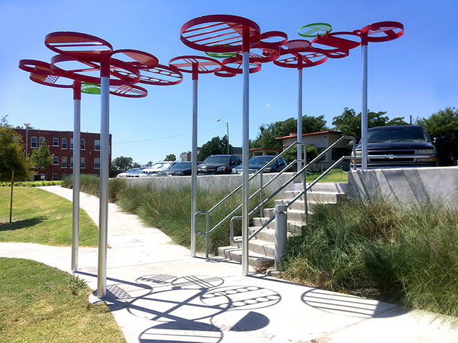 outdoor art installation in park titled Slam Dunk