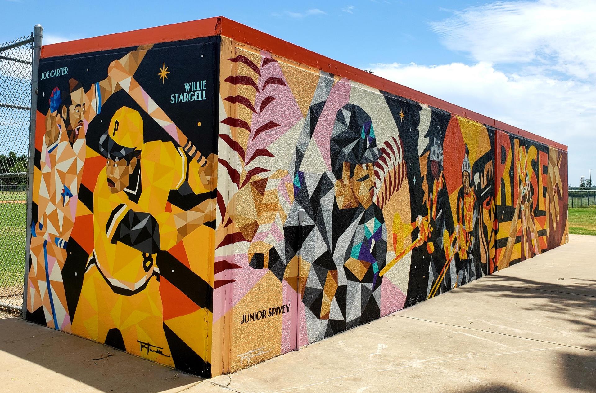 mural on baseball dugout titled Rise Up O Douglassites