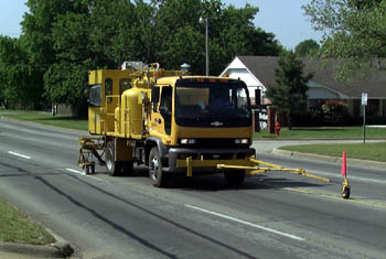 A street striping team at work