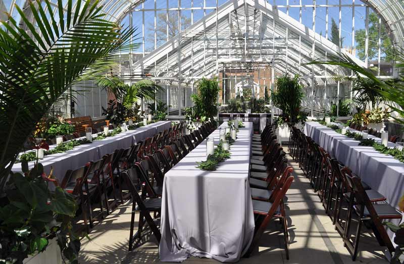 A reception banquet set-up inside the Ed Lycan Conservatory