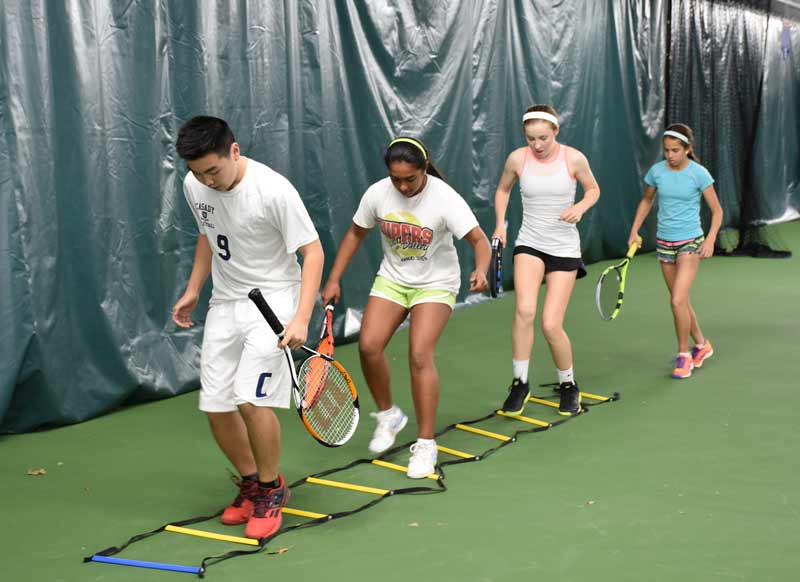 Youth work through at ladder drill at the OKC Tennis Center