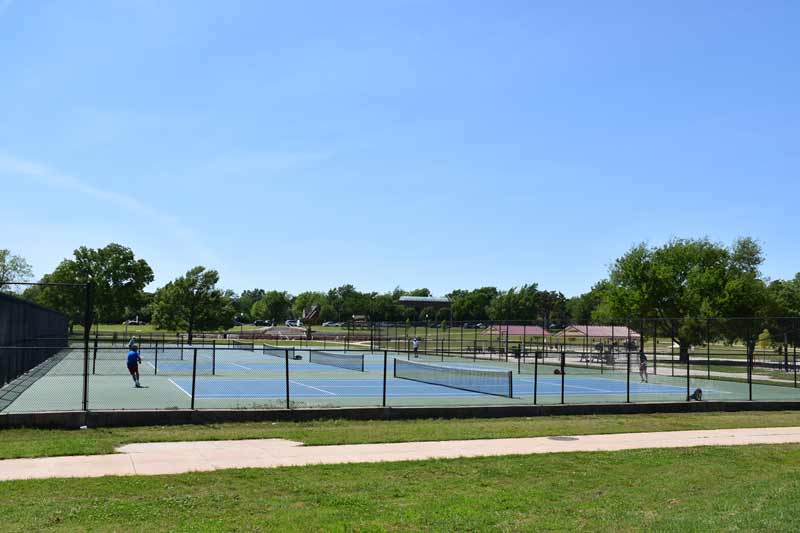 OKC residents enjoy an afternoon of tennis at Memorial Park