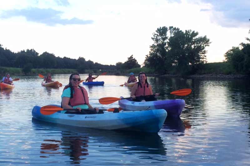Participants enjoy learning to kayak during Adult Nature Night